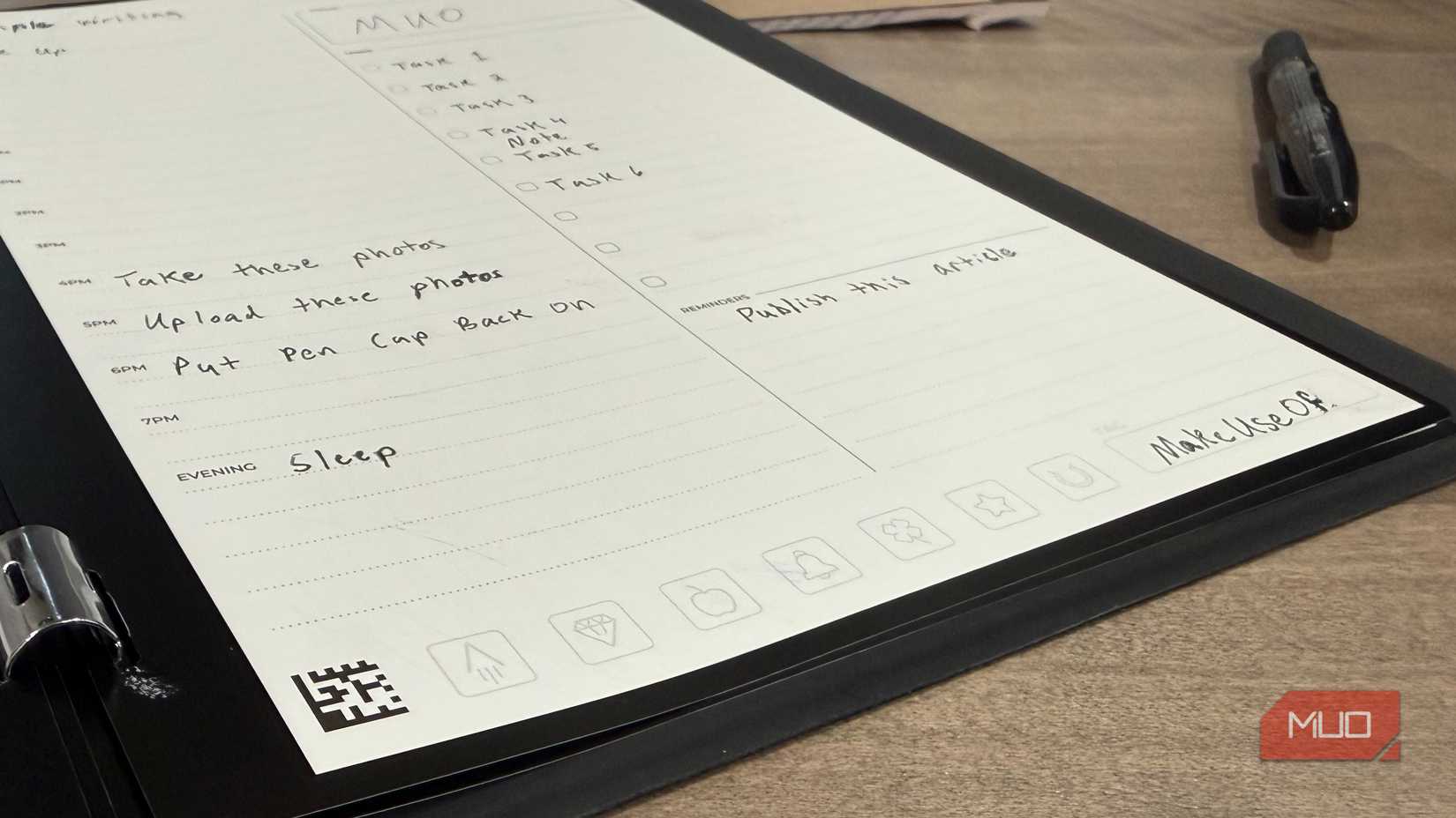 Rocketbook pro open on desk with erasable pen