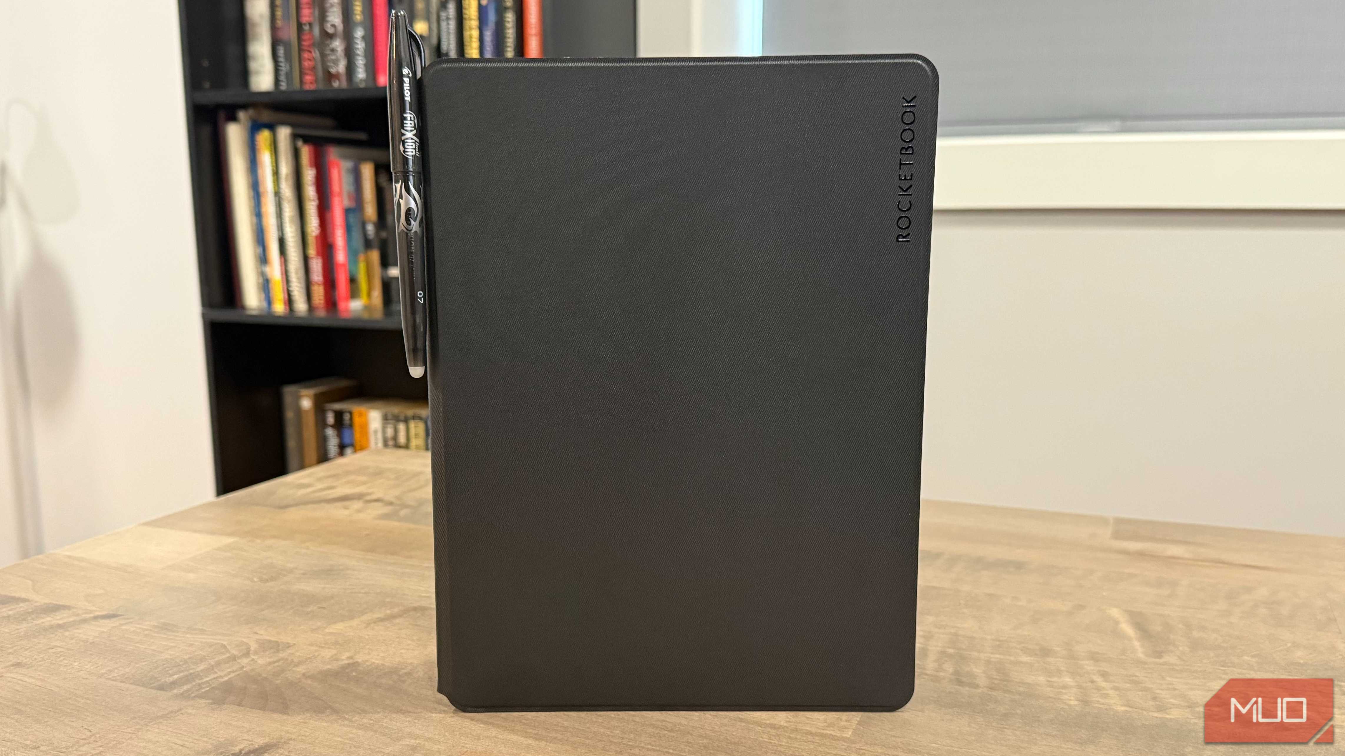 Rocketbook Pro standing on desk with pen