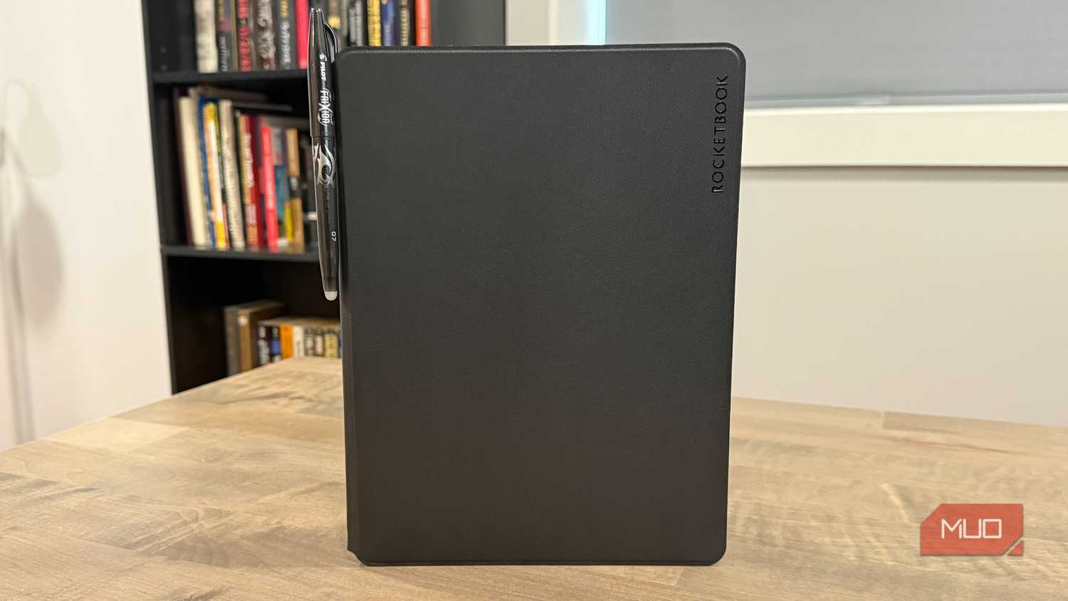 Rocketbook Pro standing on desk with pen