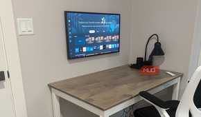 samsung frame wall mounted with cables hidden as monitor