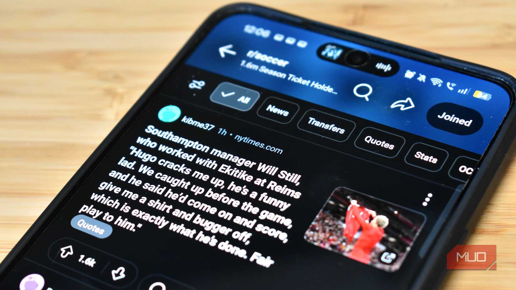 scrolling reddit soccer subreddit on smartphone app.