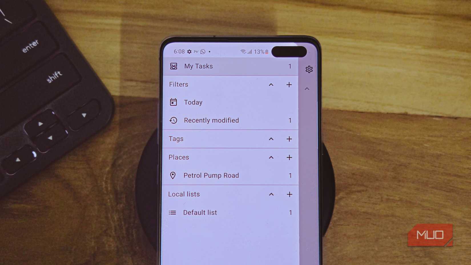 Tasks-org dashboard open on a Samsung Galaxy S10+ kept on a wooden table
