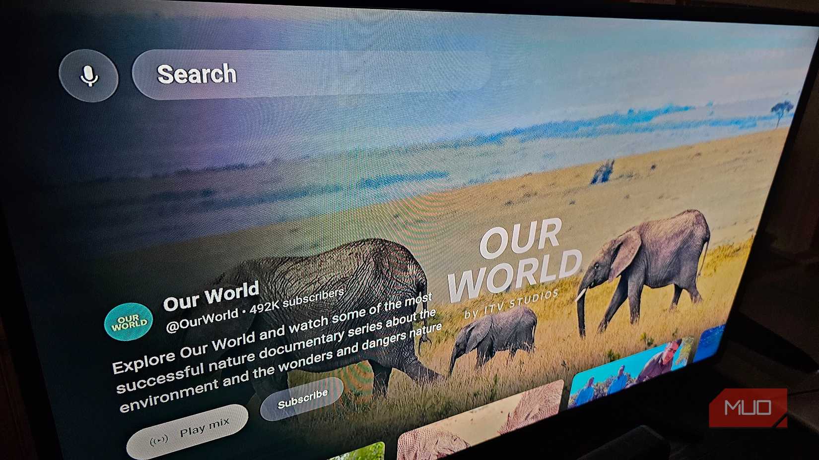 The YouTube app opened to the Our World channel.