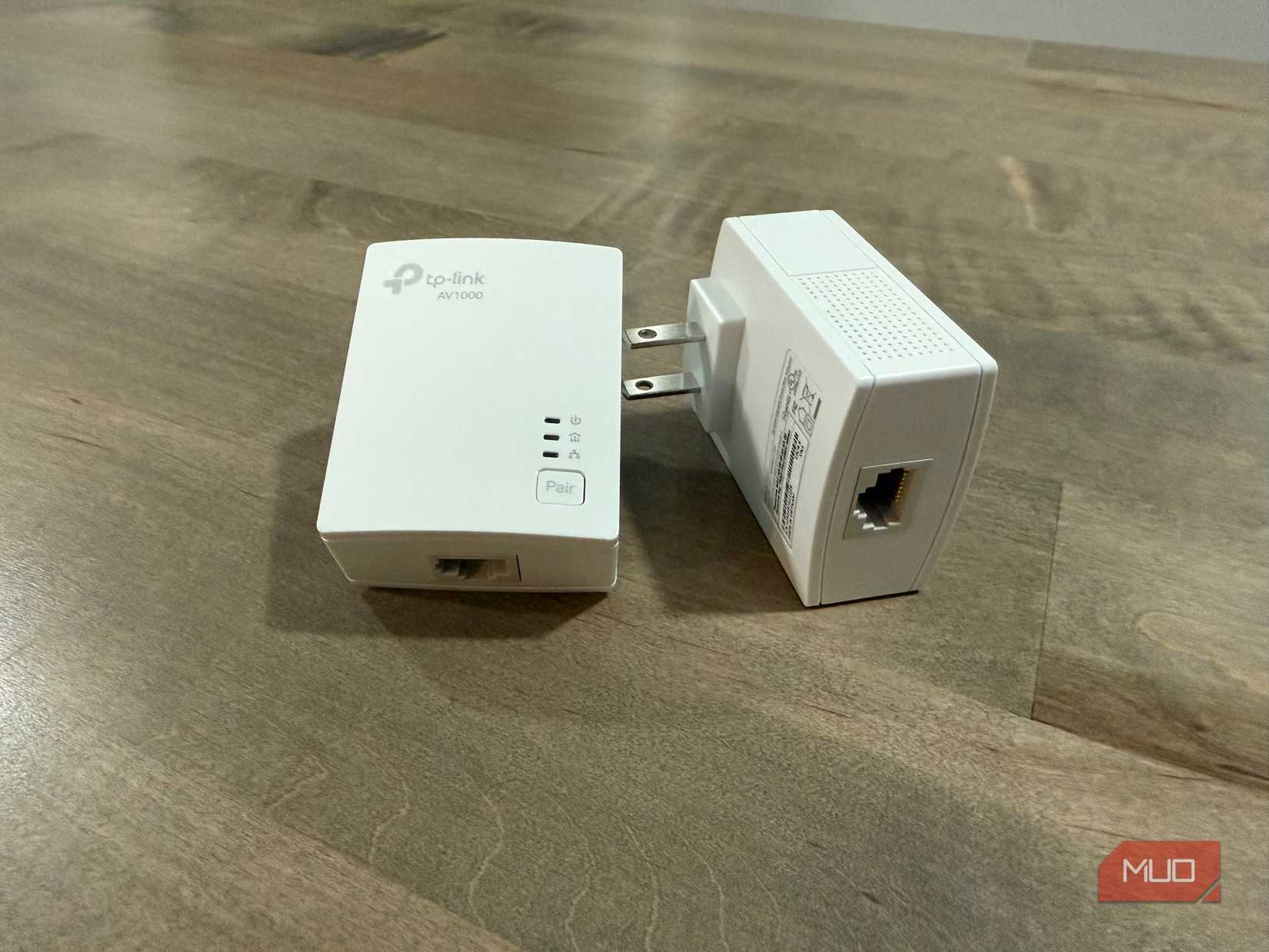 tp link powerline adapter on desk