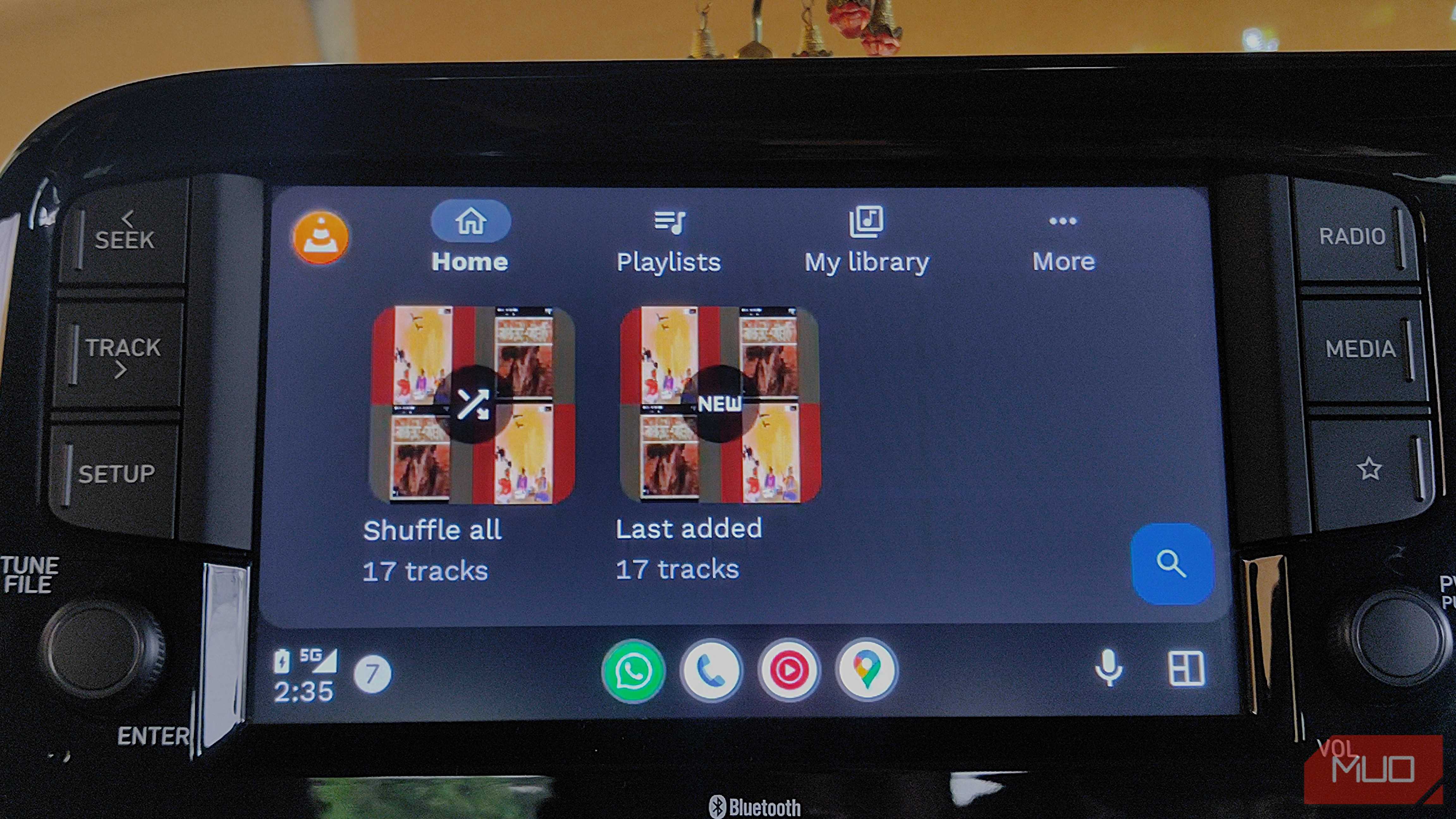 VLC Media Player on Android Auto with multiple library options visible.
