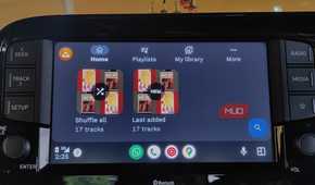 VLC Media Player on Android Auto with multiple library options visible.
