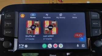 VLC Media Player on Android Auto with multiple library options visible.