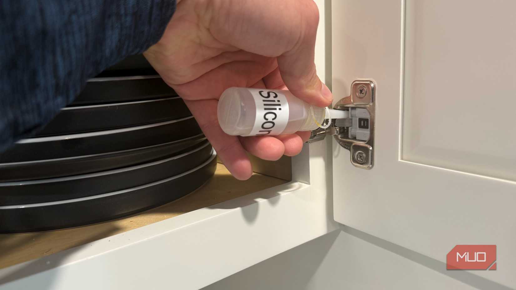 adding silicone oil to kitchen cabinet hinge