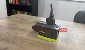 Dyson v8 ryobi attachment on desk