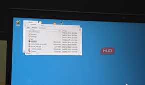 Haiku OS Deskbar open on a HP laptop