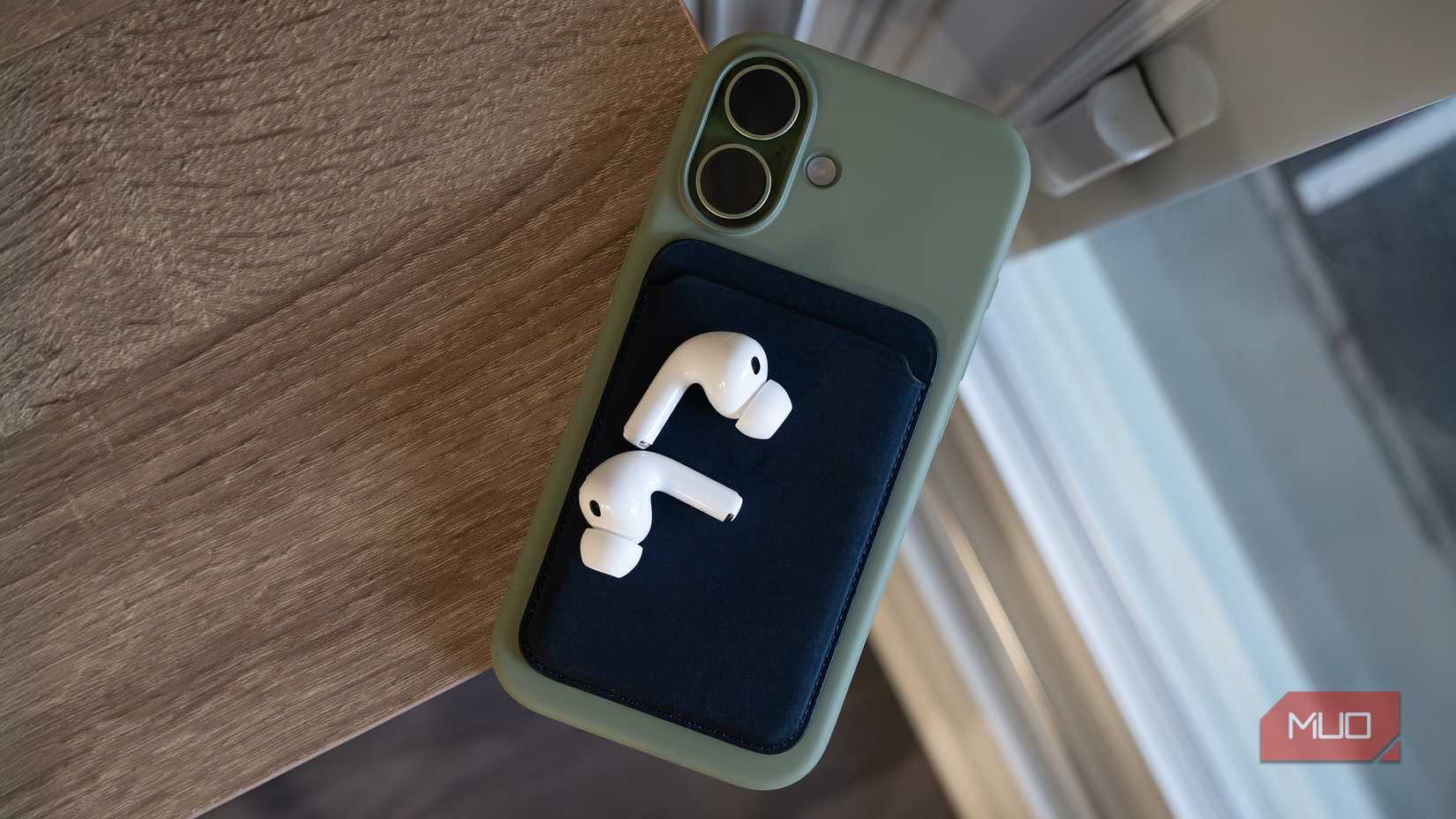 iPhone 17 with wallet case and Airpods Pro 3