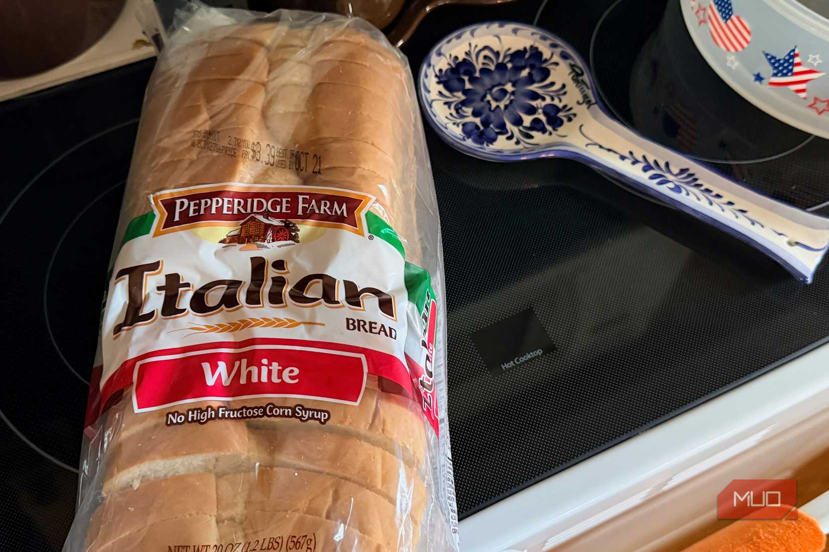 A loaf of Italian bread in a kitchen.