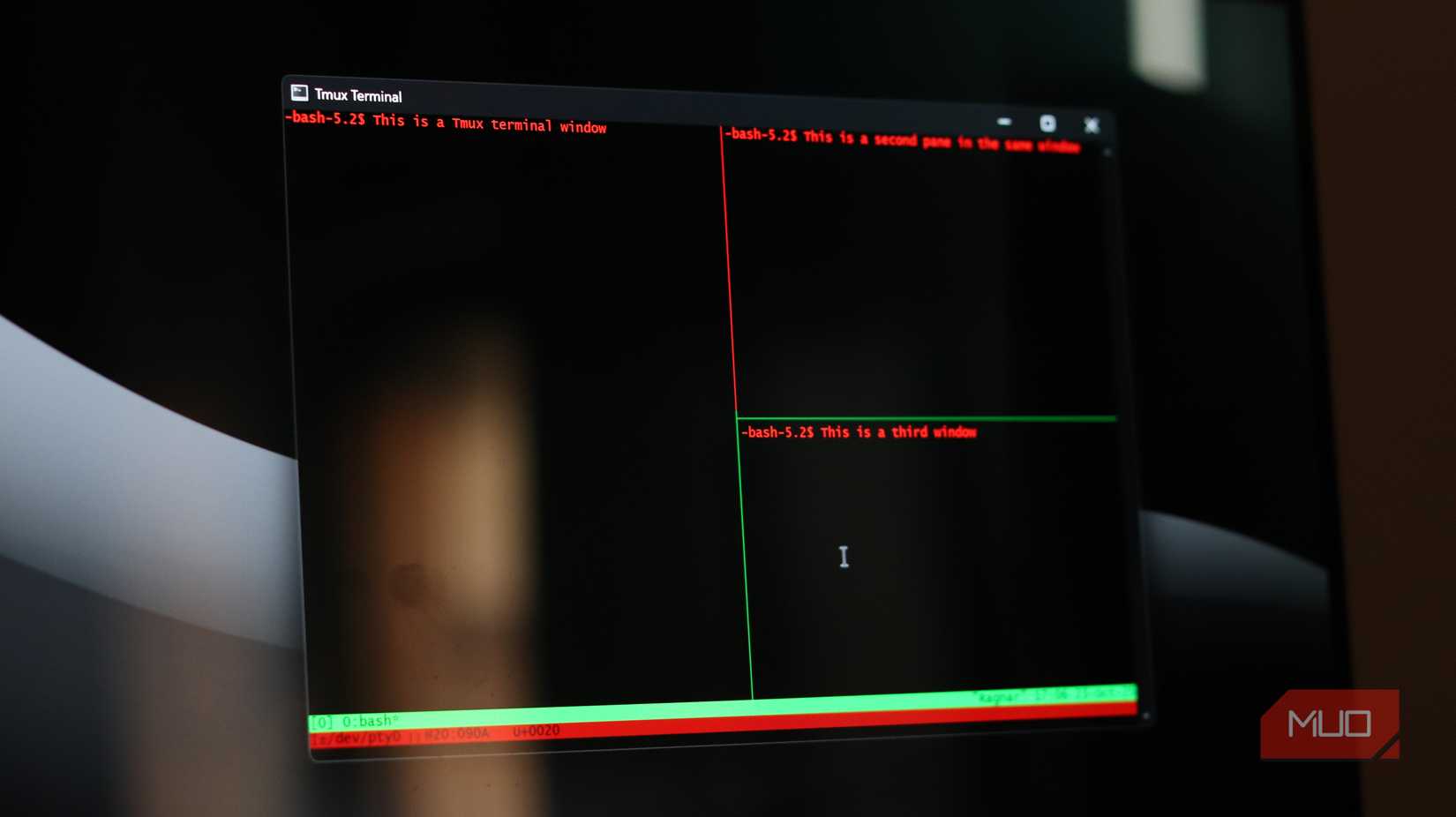 Itmux terminal with three panes on a black background.