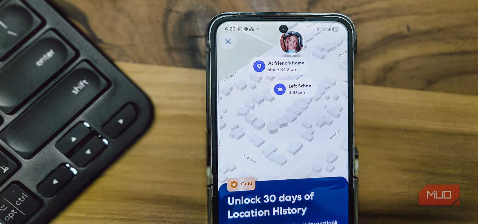 Life 360 app open on a Samsung Galaxy Z Flip 6 kept on a wooden table  