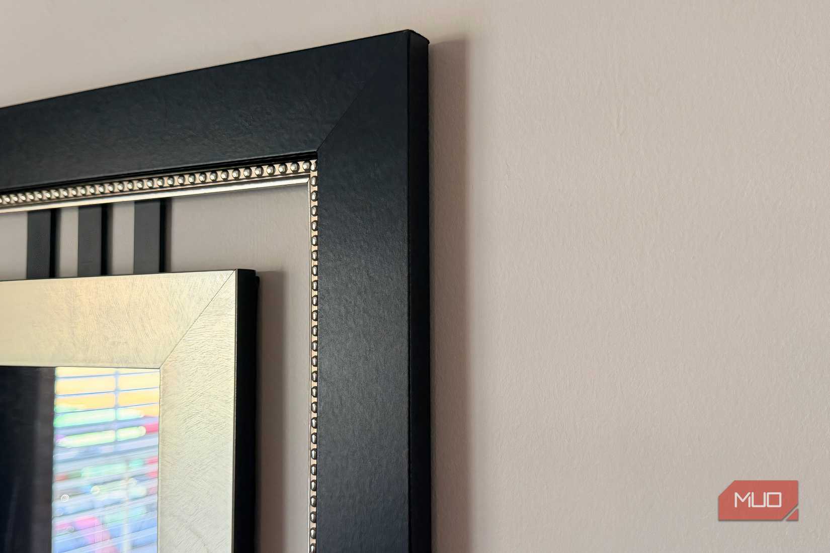 The corner of a glass mirror.