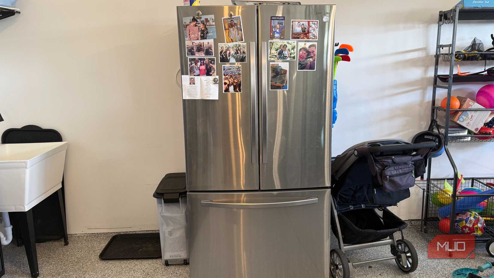 silver fridge in garage