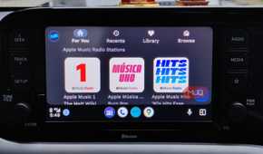 Radio stations on TuneIn Radio on Android Auto.