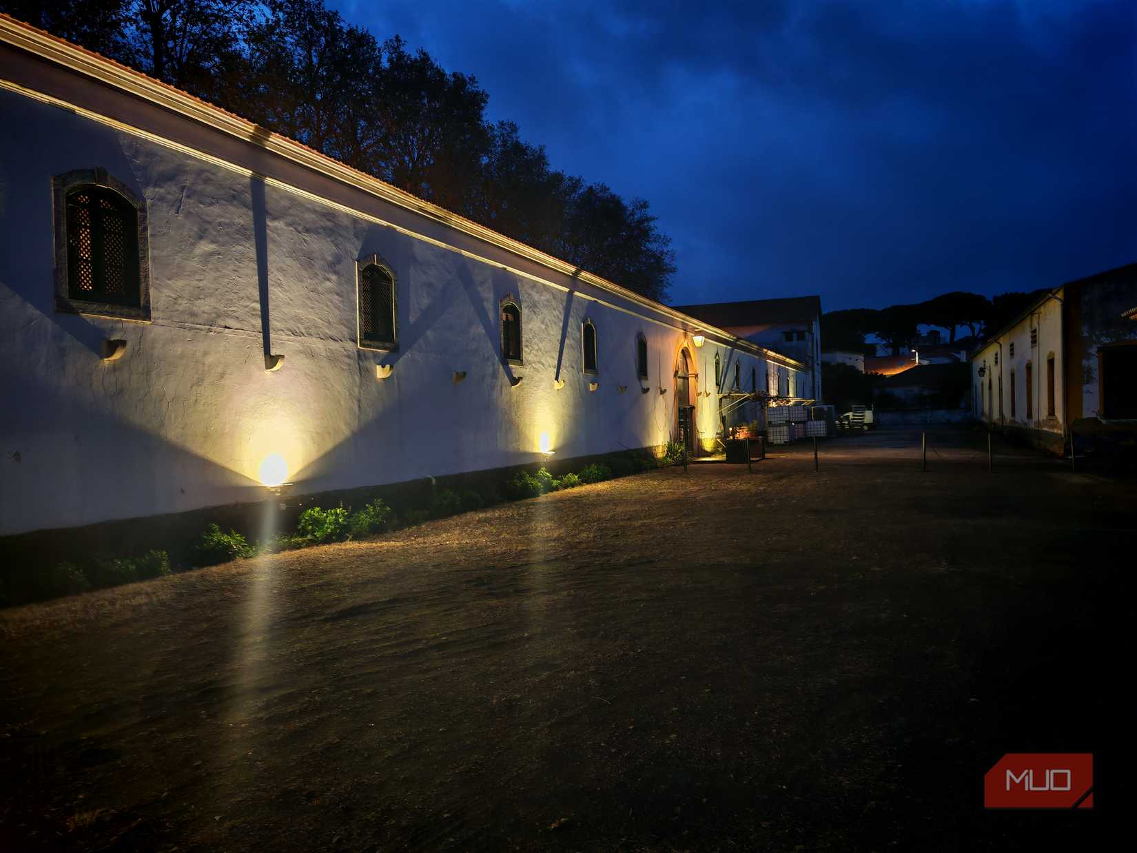 a courtyard at twilight.