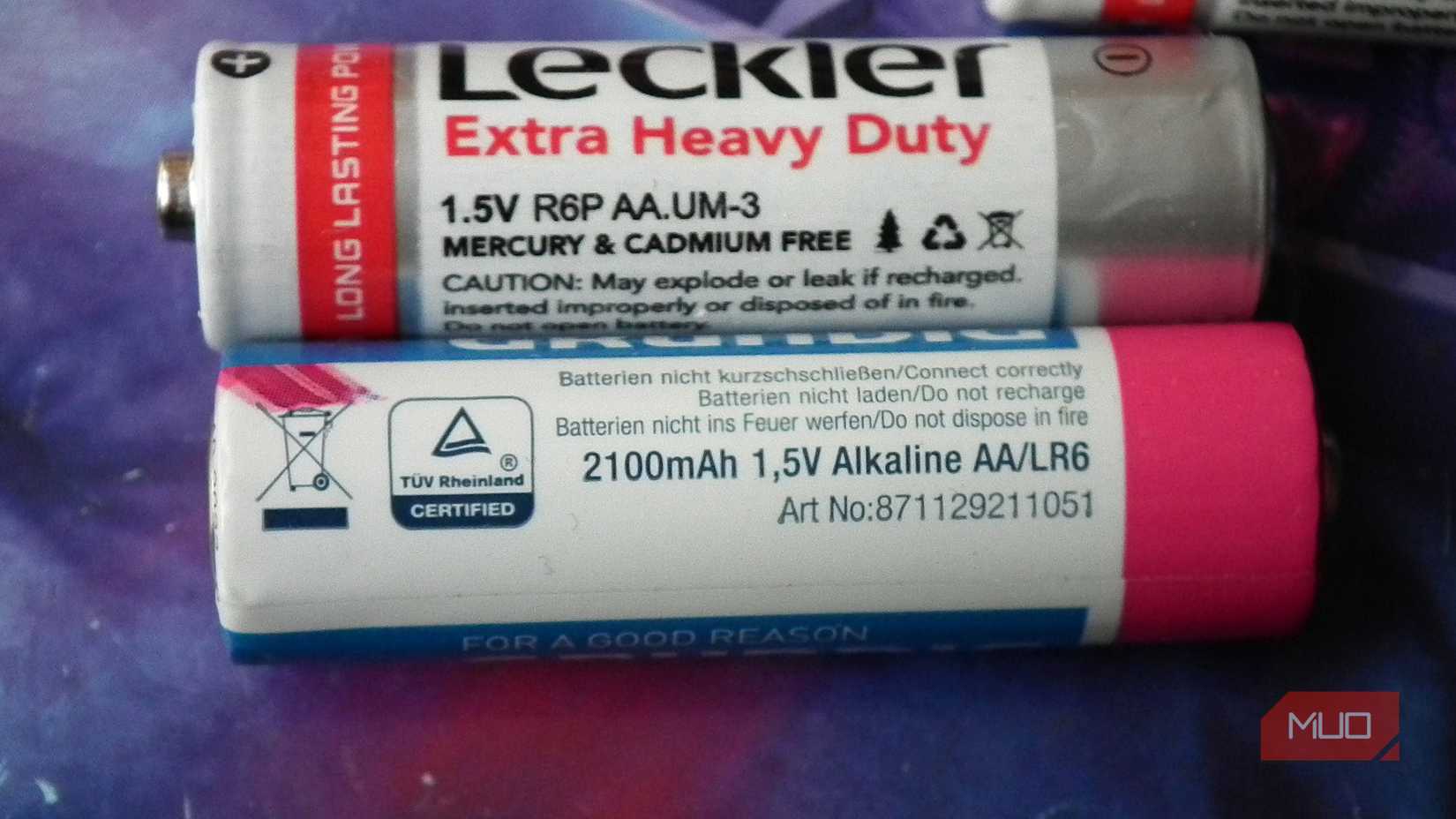 An LR6 AA battery next to a R6 AA battery