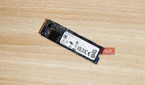 An M.2 NVMe SSD on a table.