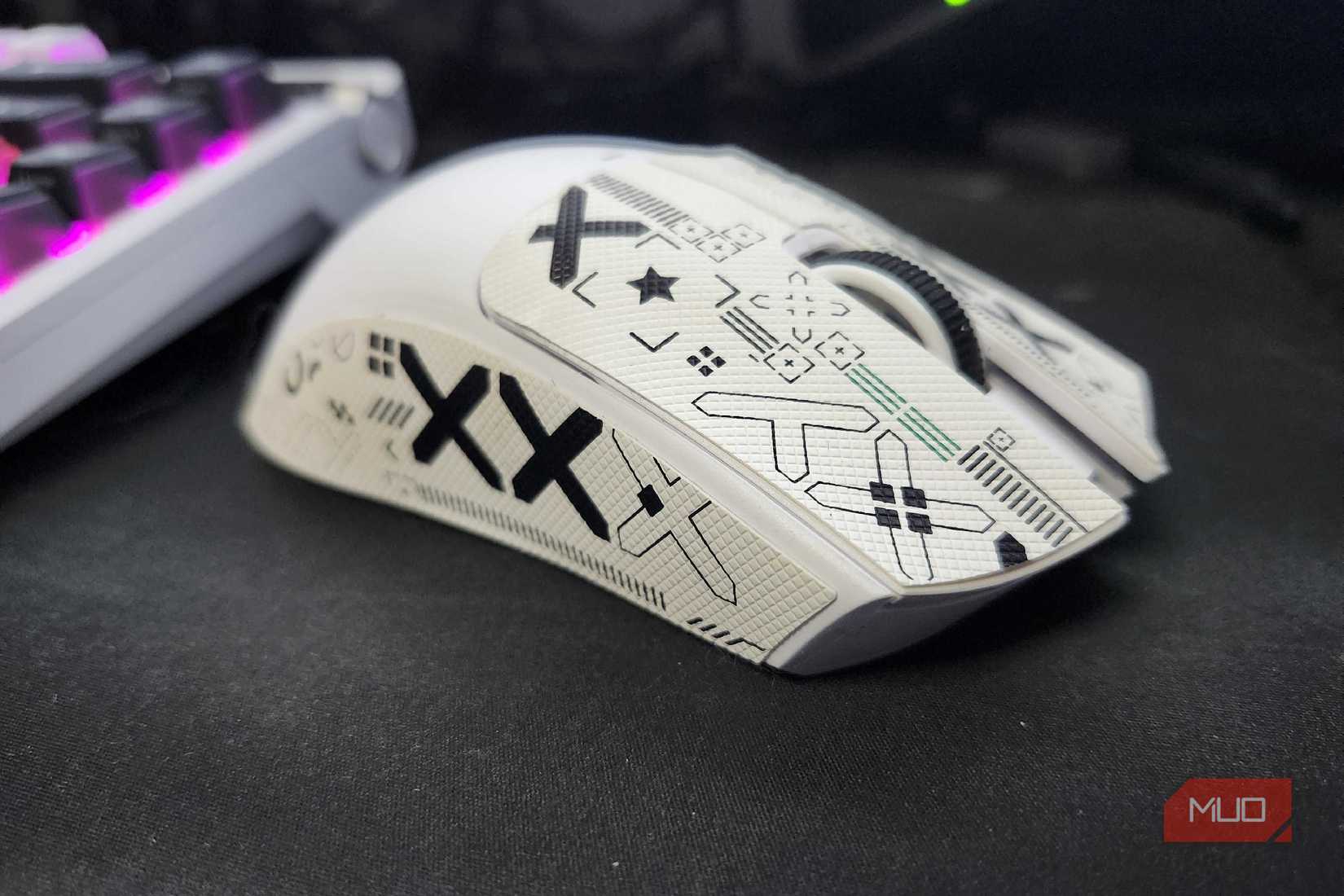 The side profile of the Attack Shark X11 mouse, showing off the grip tape that is included with the mouse