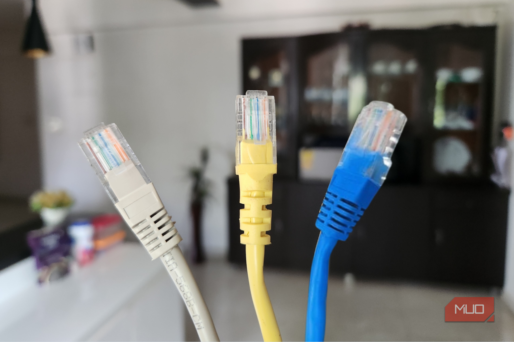 Blue yellow and gray Ethernet cables