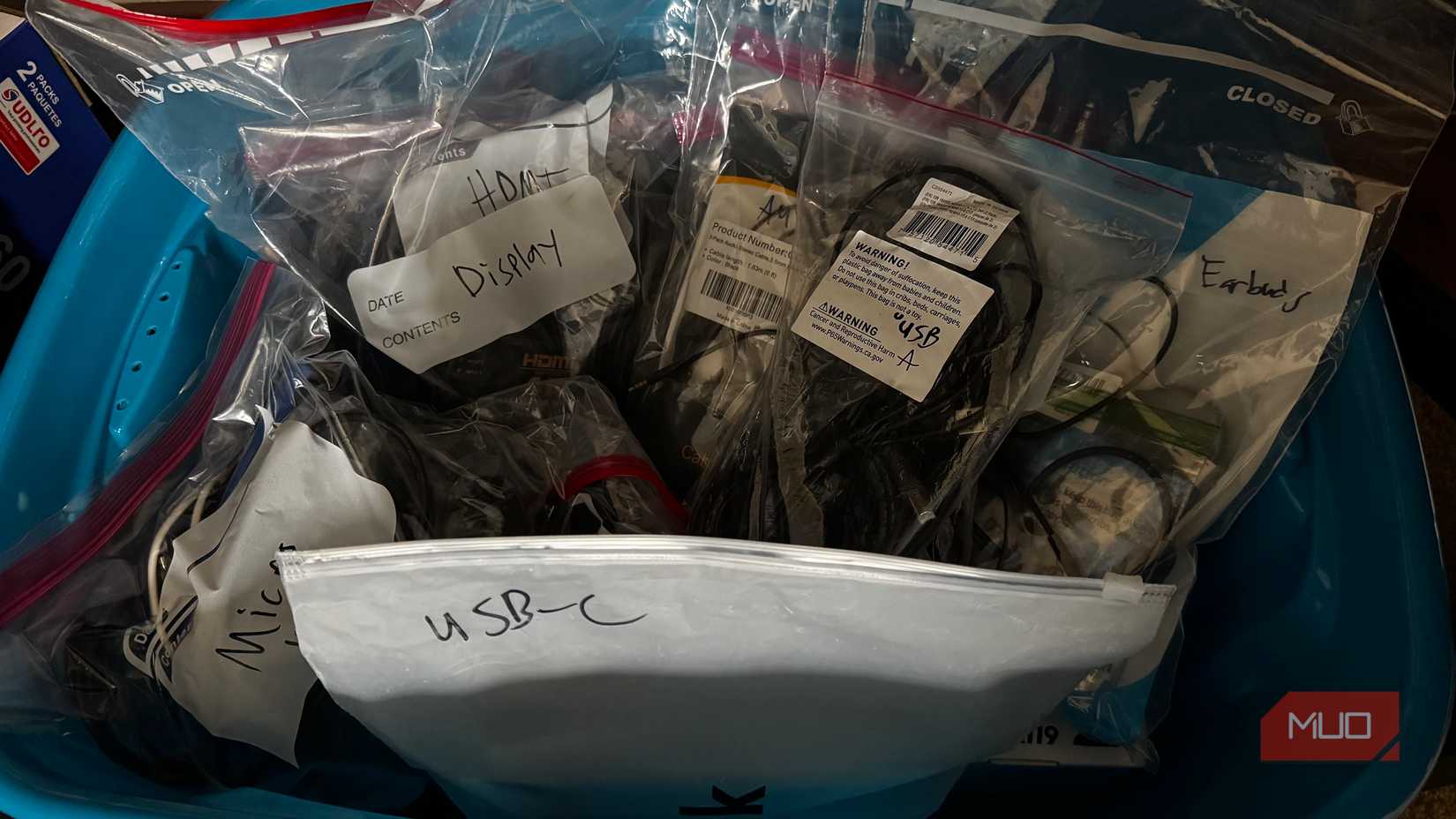 Box With Bags of Computer Cables Inside