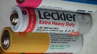 Close up shot of a line of AA batteries