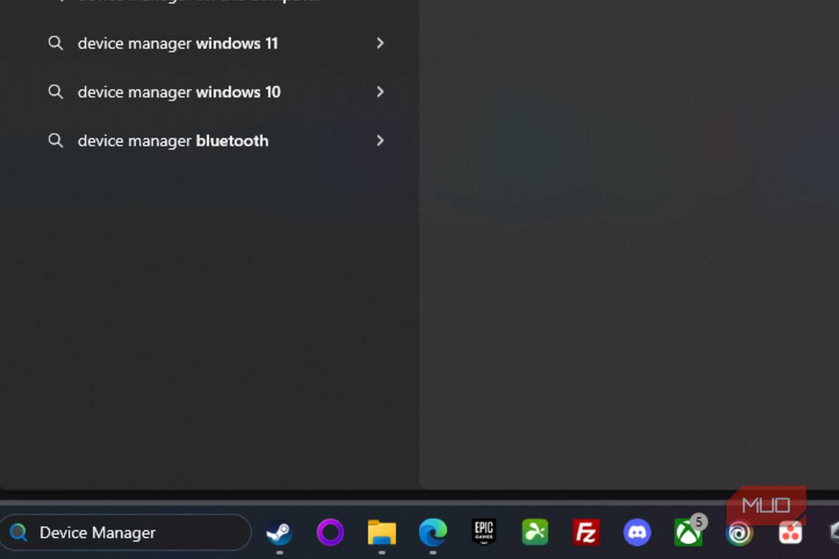 Searching for Device Manager via the Windows Search Bar at the bottom of the screen