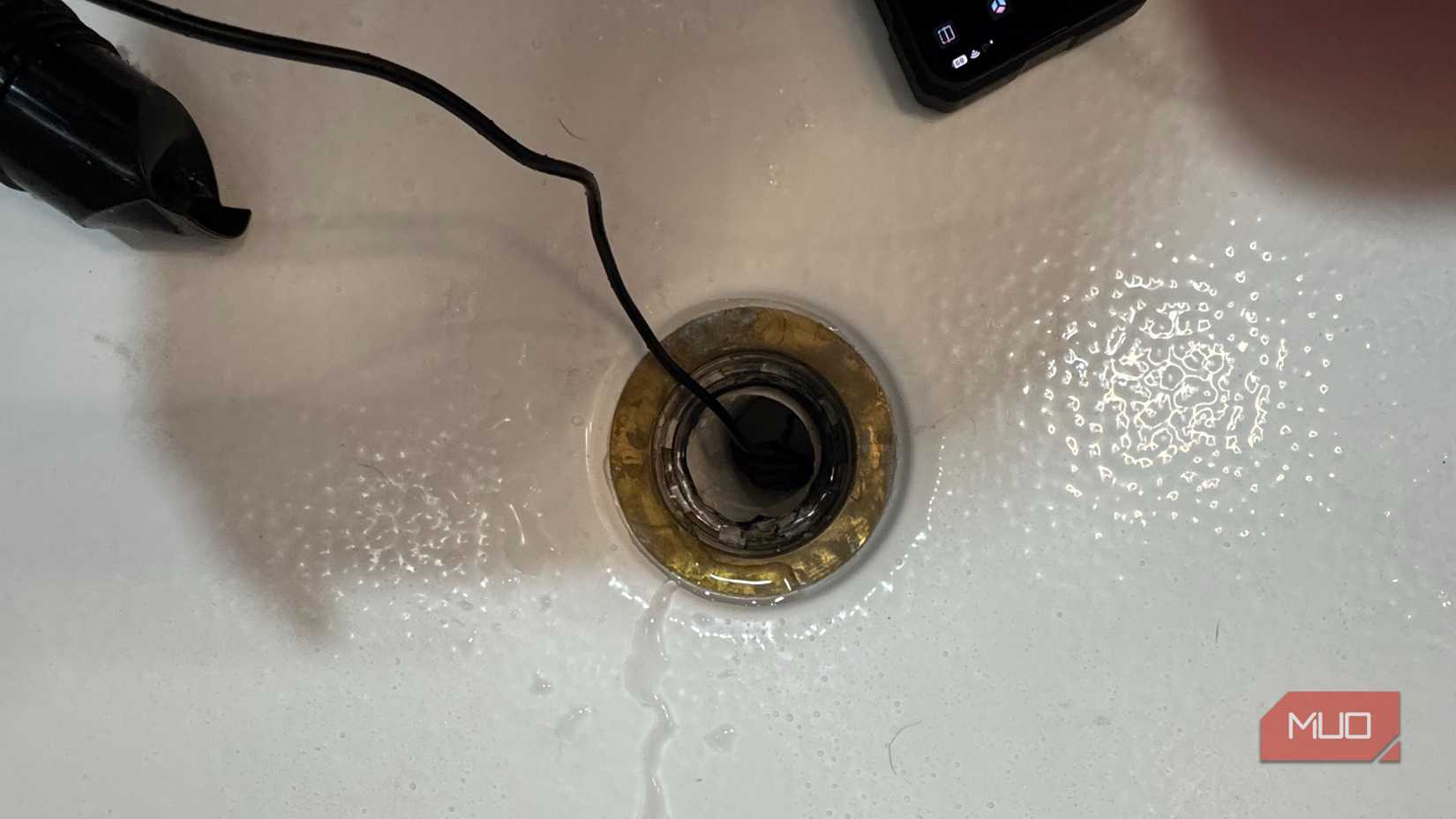 Drain endoscope tool snaked down shower drain