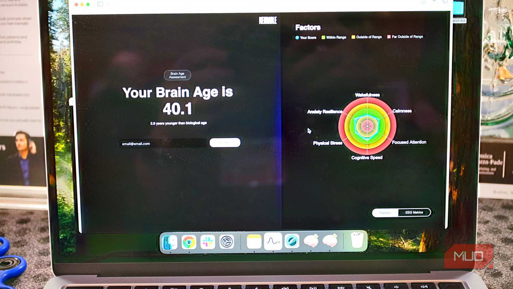 The Neurable app displays a brain age of 40.1, a score determined after a two-minute scan conducted using EEG technology through the headphones.
