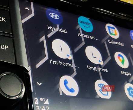 Assistant routines shortcuts visible in in-car console on Android Auto launcher.