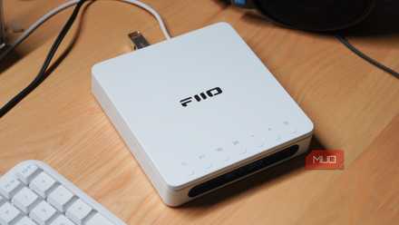 The Fiio DM13 on a desk ripping lossless audio files.
