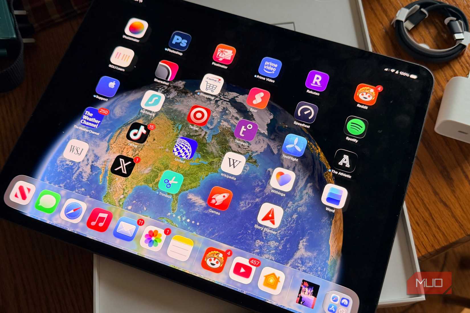 An iPad Pro sitting on its open box.