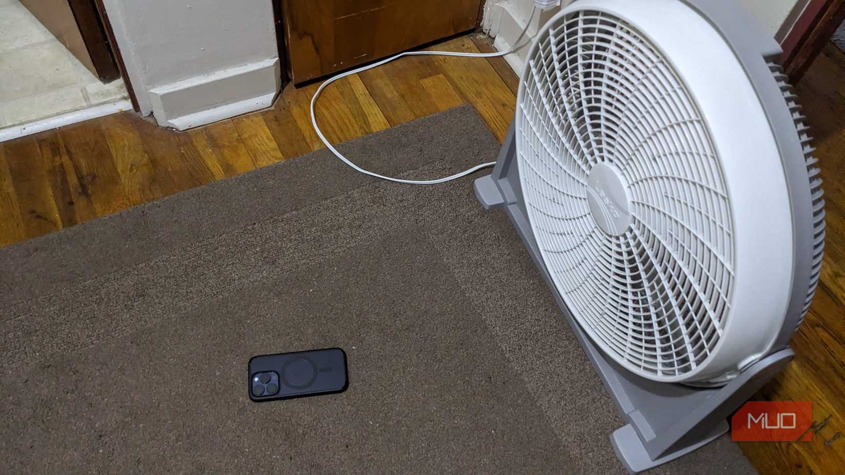 iPhone sitting in front of fan