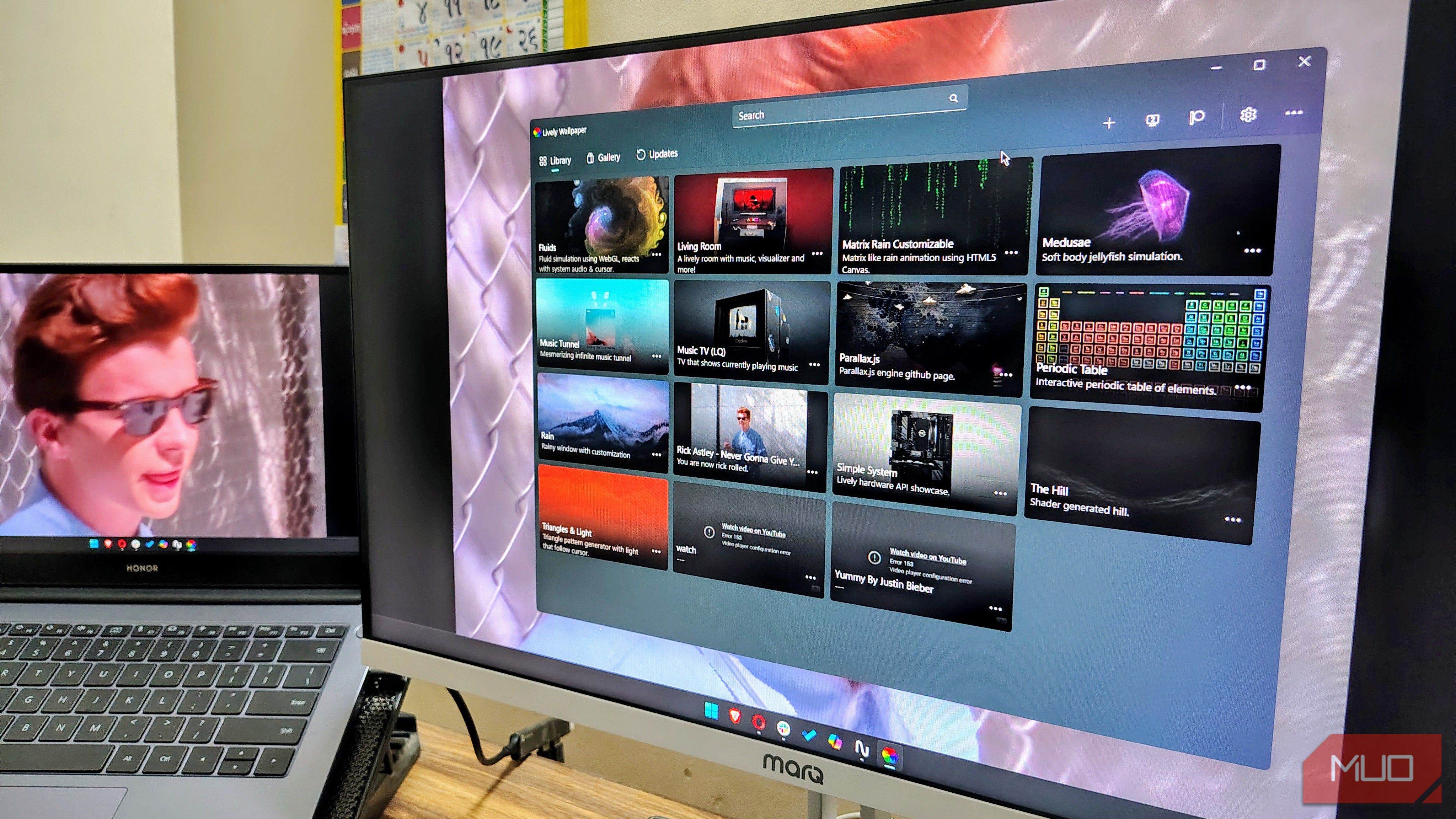 Lively Wallpaper app running on Windows desktop with multiple monitors.