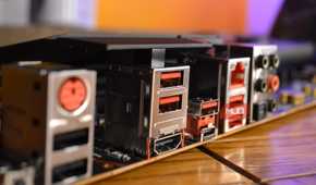 Motherboard showing red USB ports
