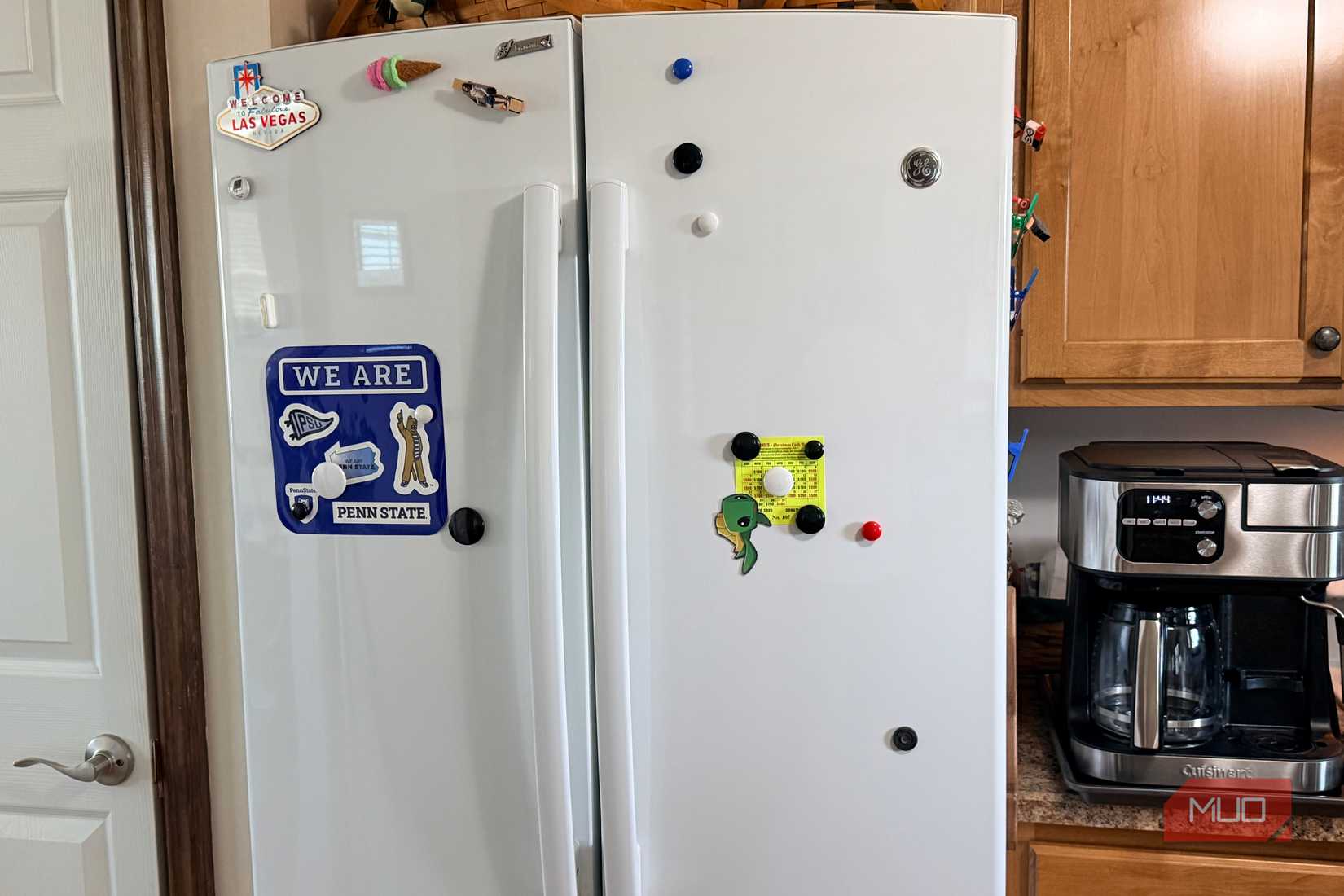 A refrigerator in a kitchen. 
