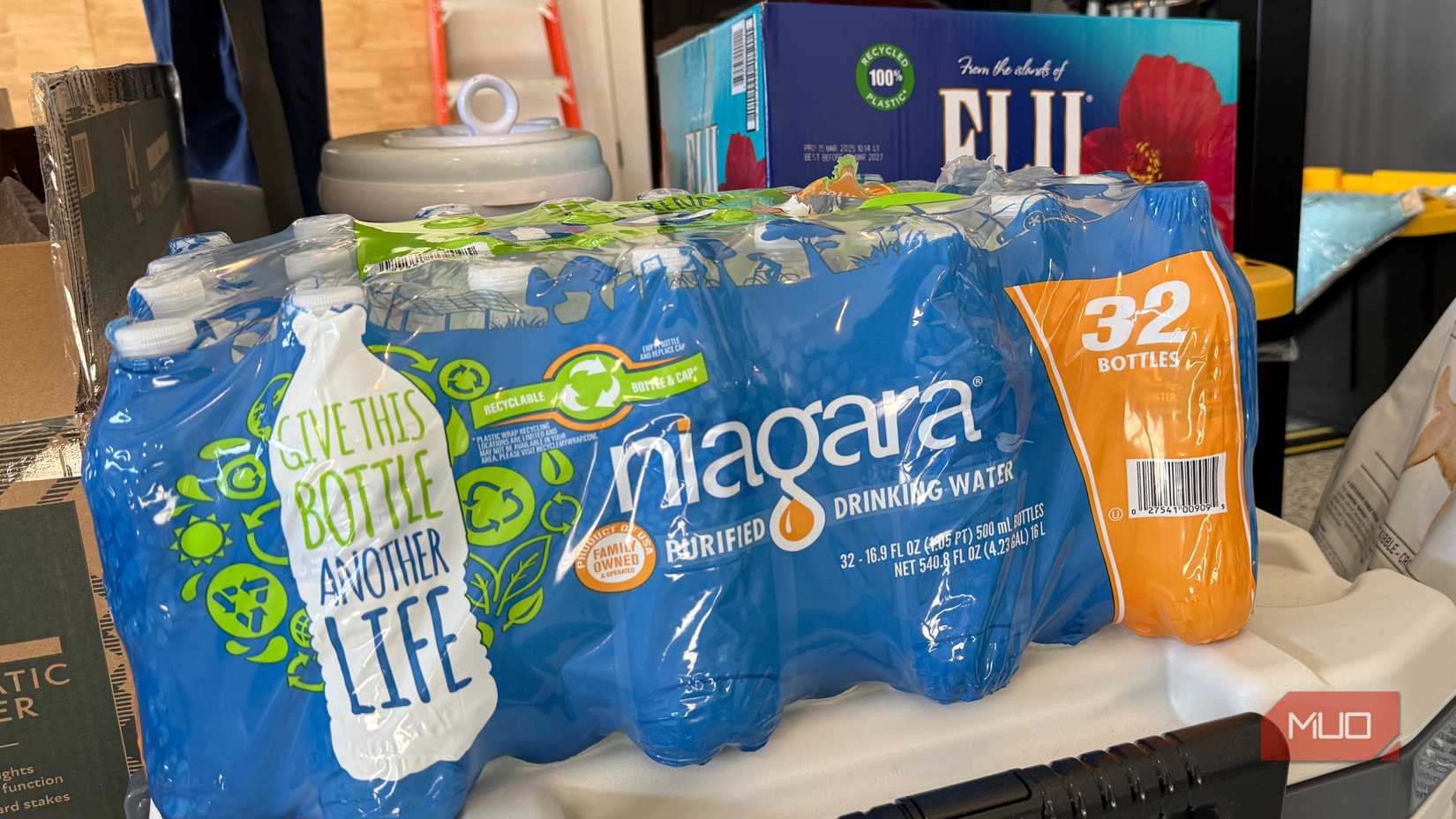 sealed container of water bottles