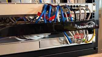 Serveral ethernet cables routed through organizer