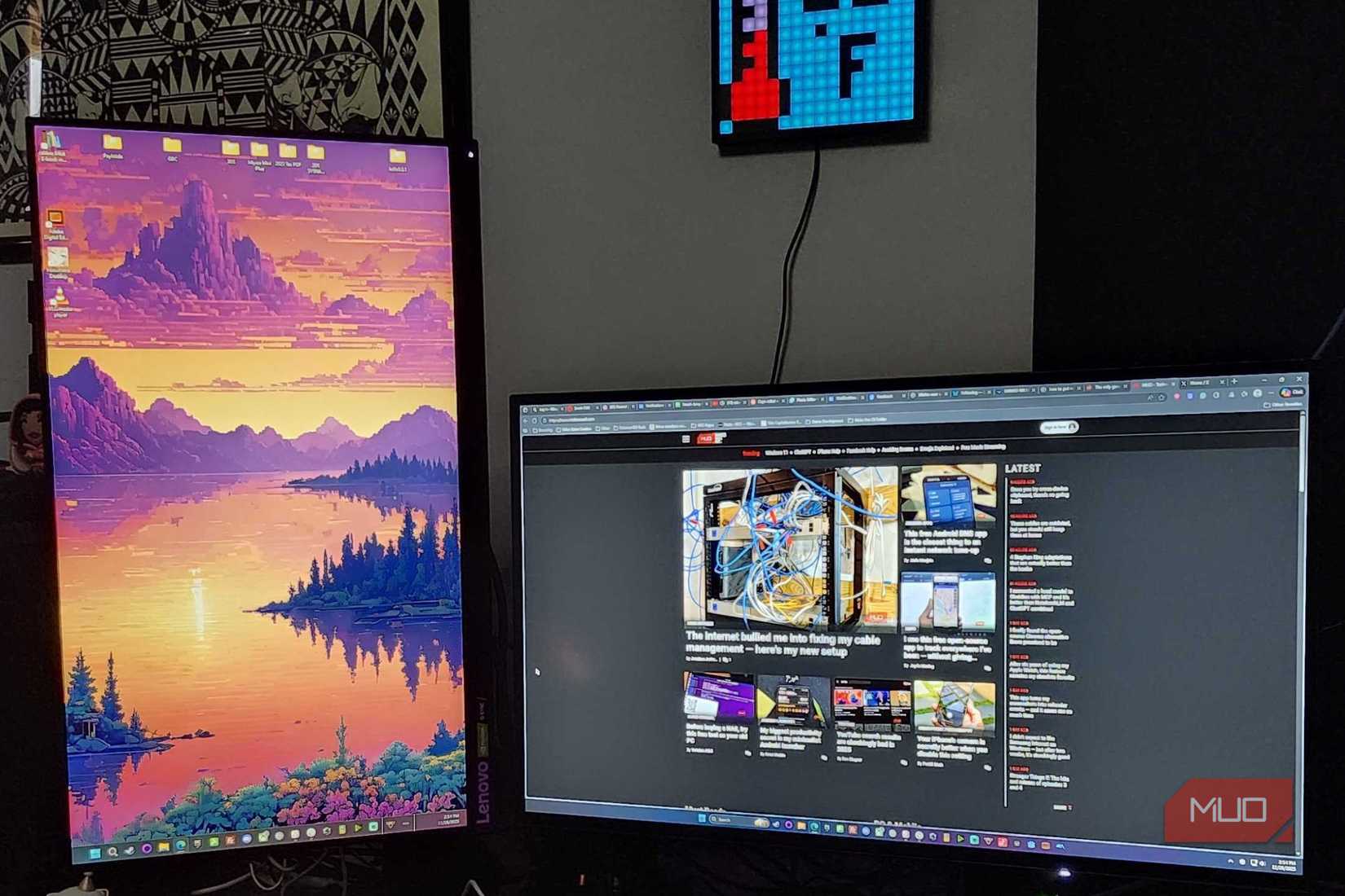 Two monitors on a desk, with one vertical and the other horizontal