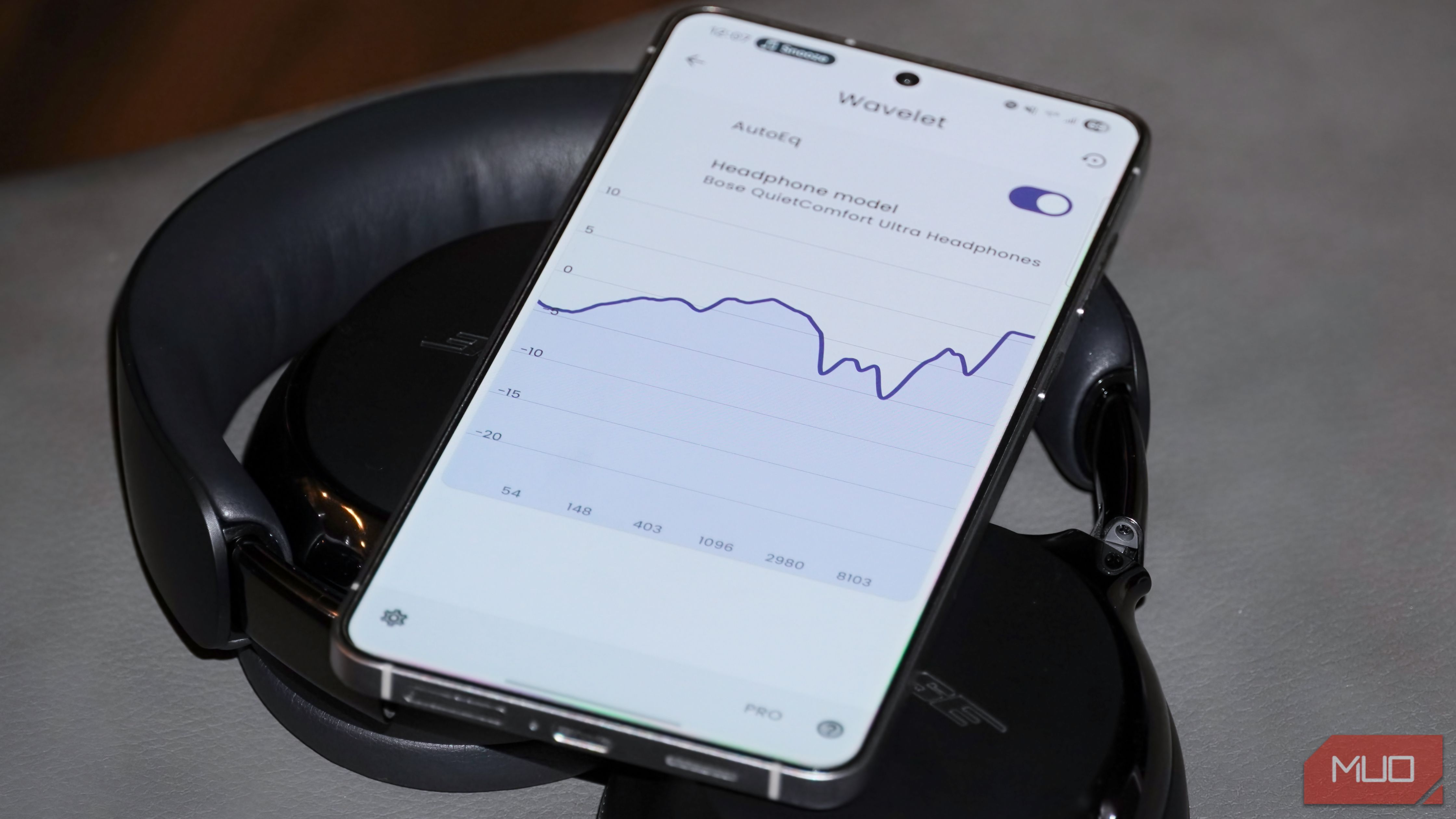 The Wavelet app open atop a pair of Bose headphones.