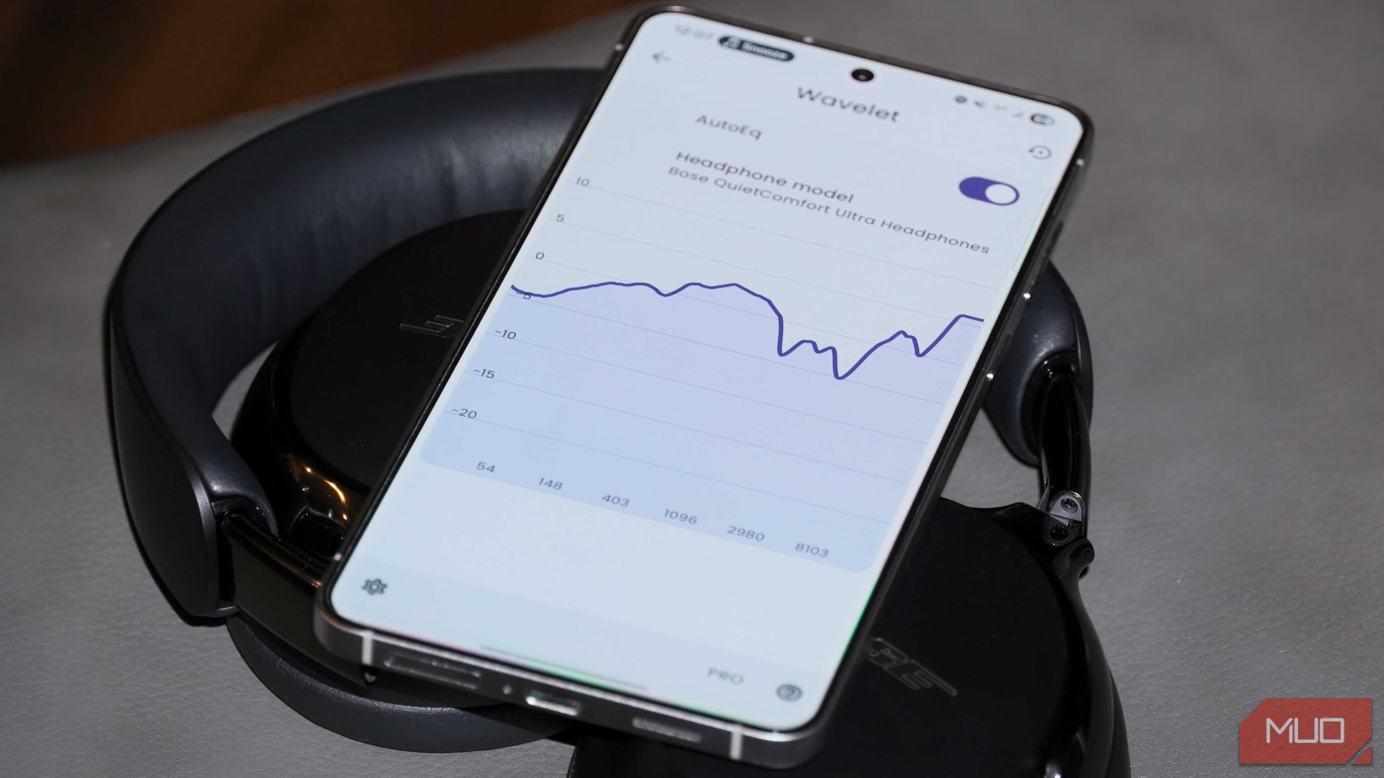 The Wavelet app open atop a pair of Bose headphones.