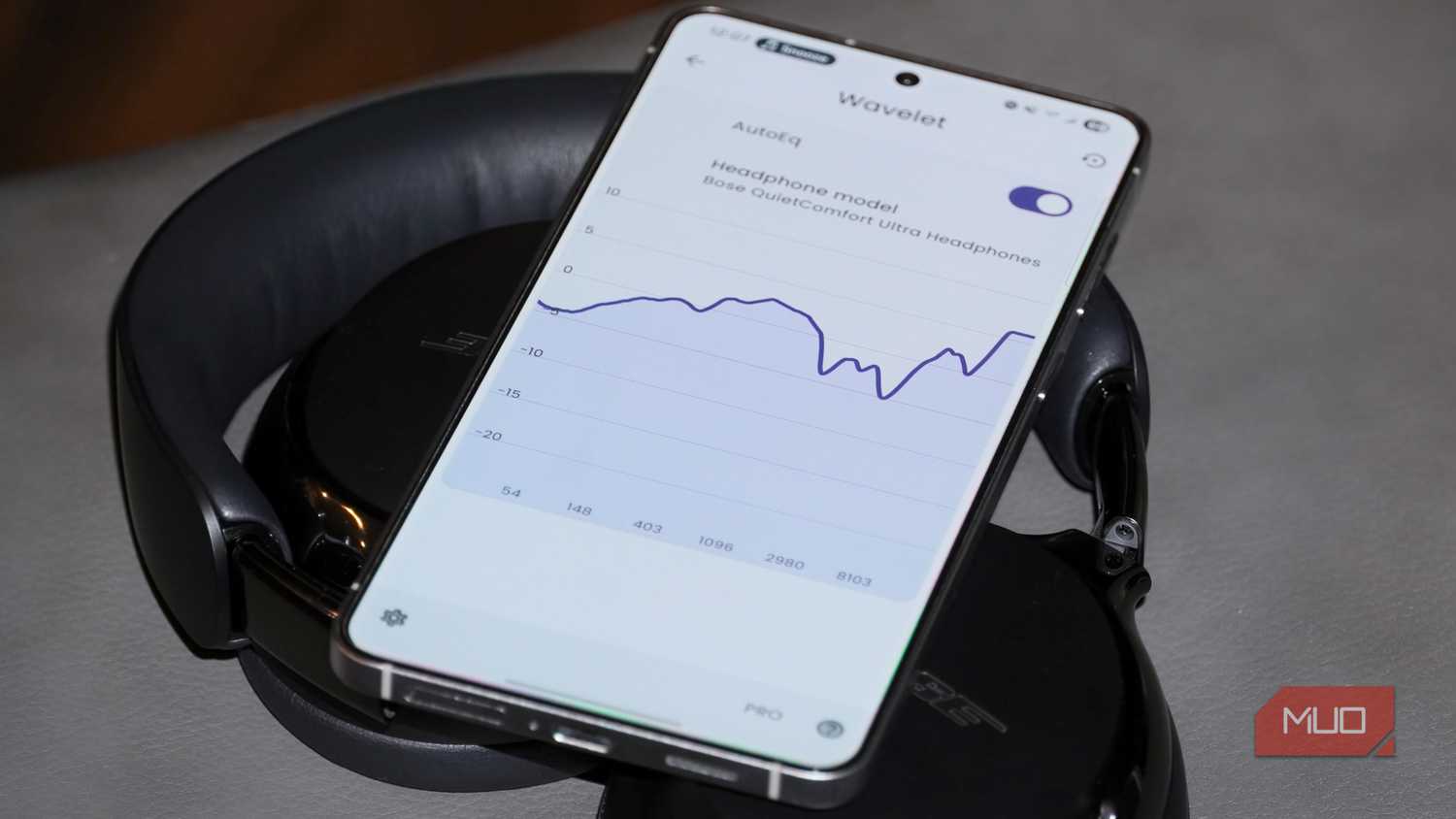 The Wavelet app open atop a pair of Bose headphones.