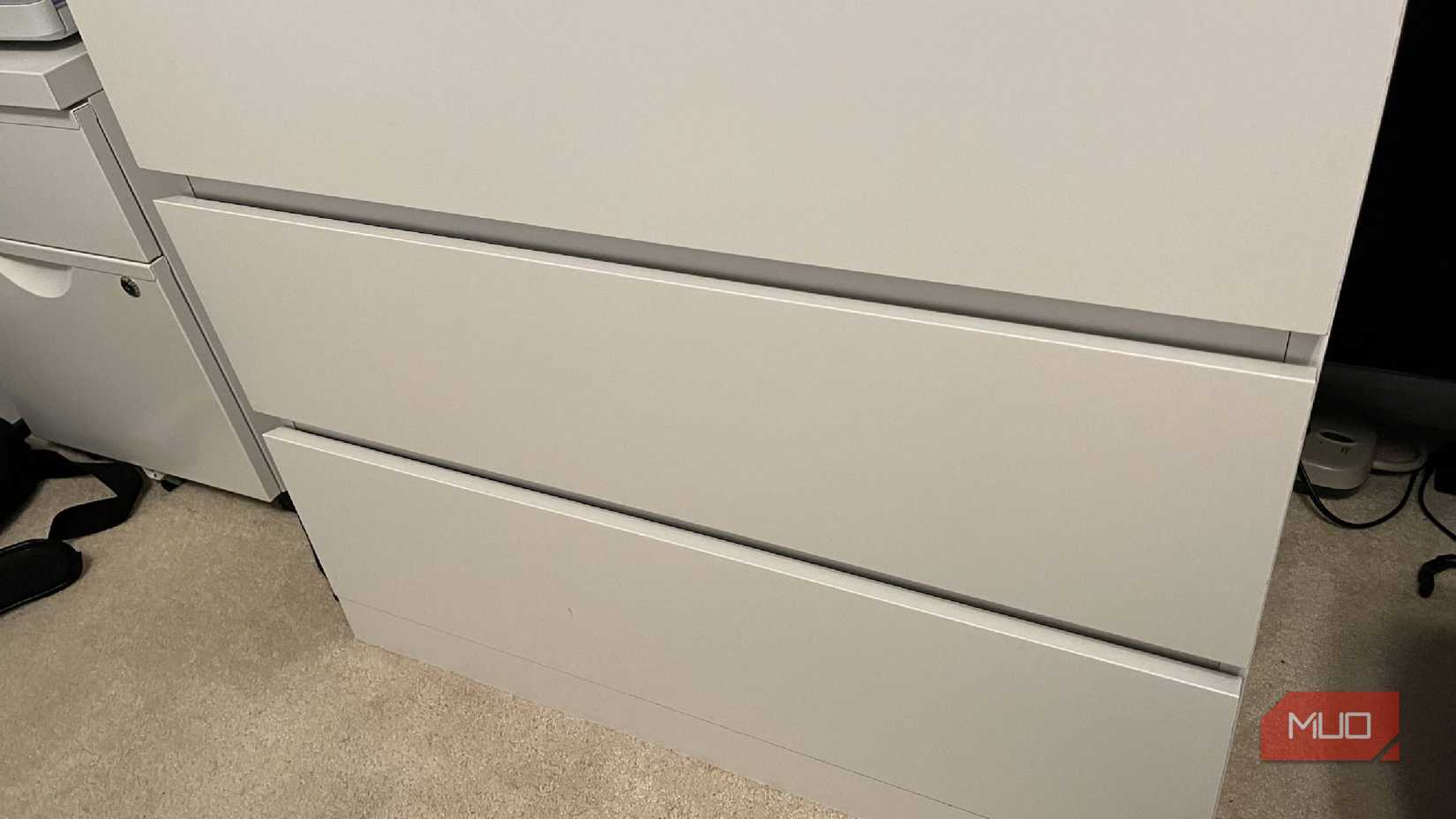 A dresser unit used as the drawers for a desk