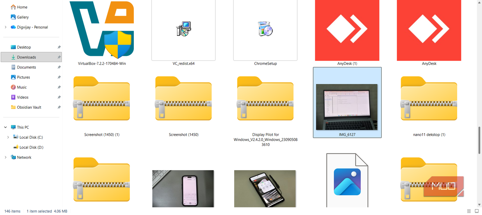 Windows Downloads folder showing old installers and ZIP files