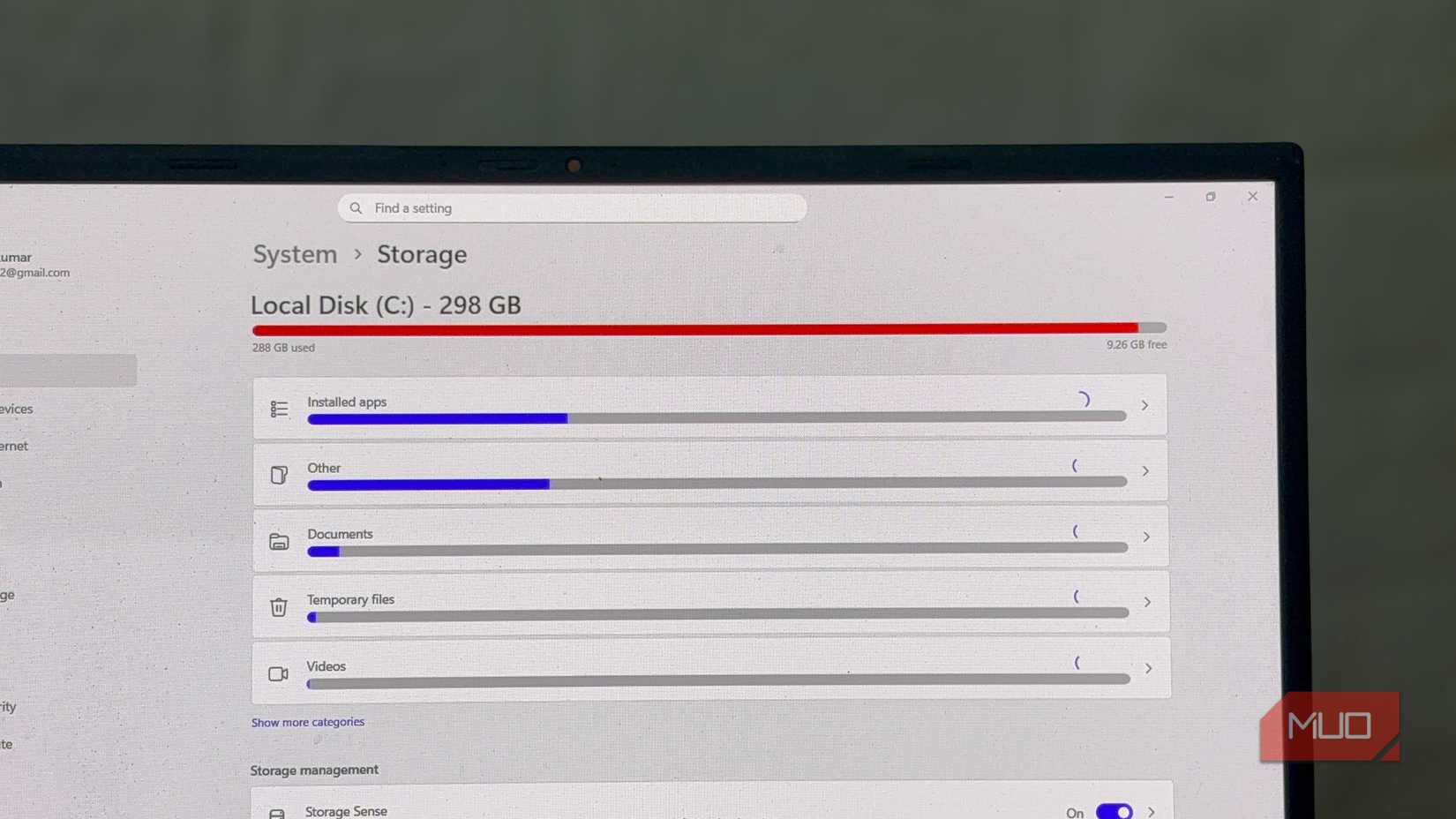Windows storage showing nearly full C drive.