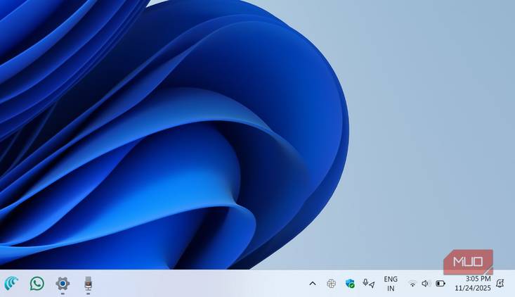 Windows taskbar showing location and microphone icons