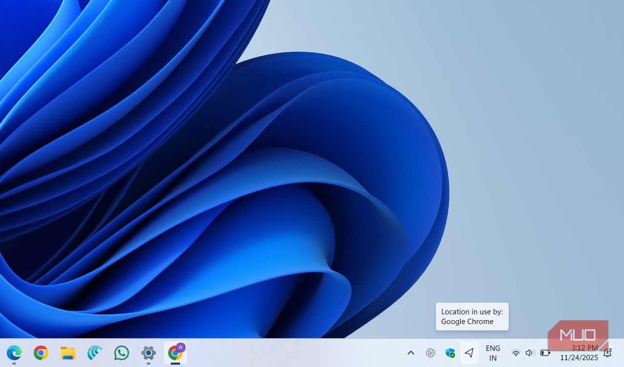 Windows taskbar showing location icon