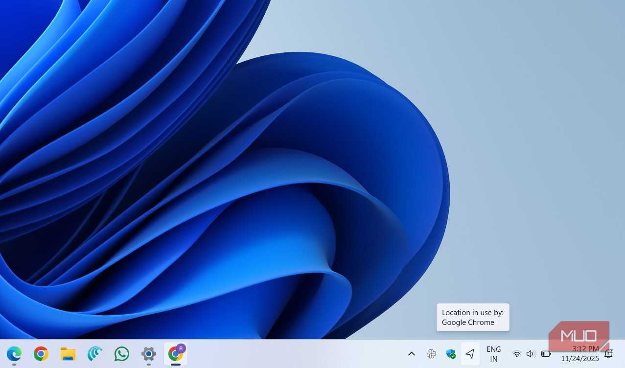 Windows taskbar showing location icon